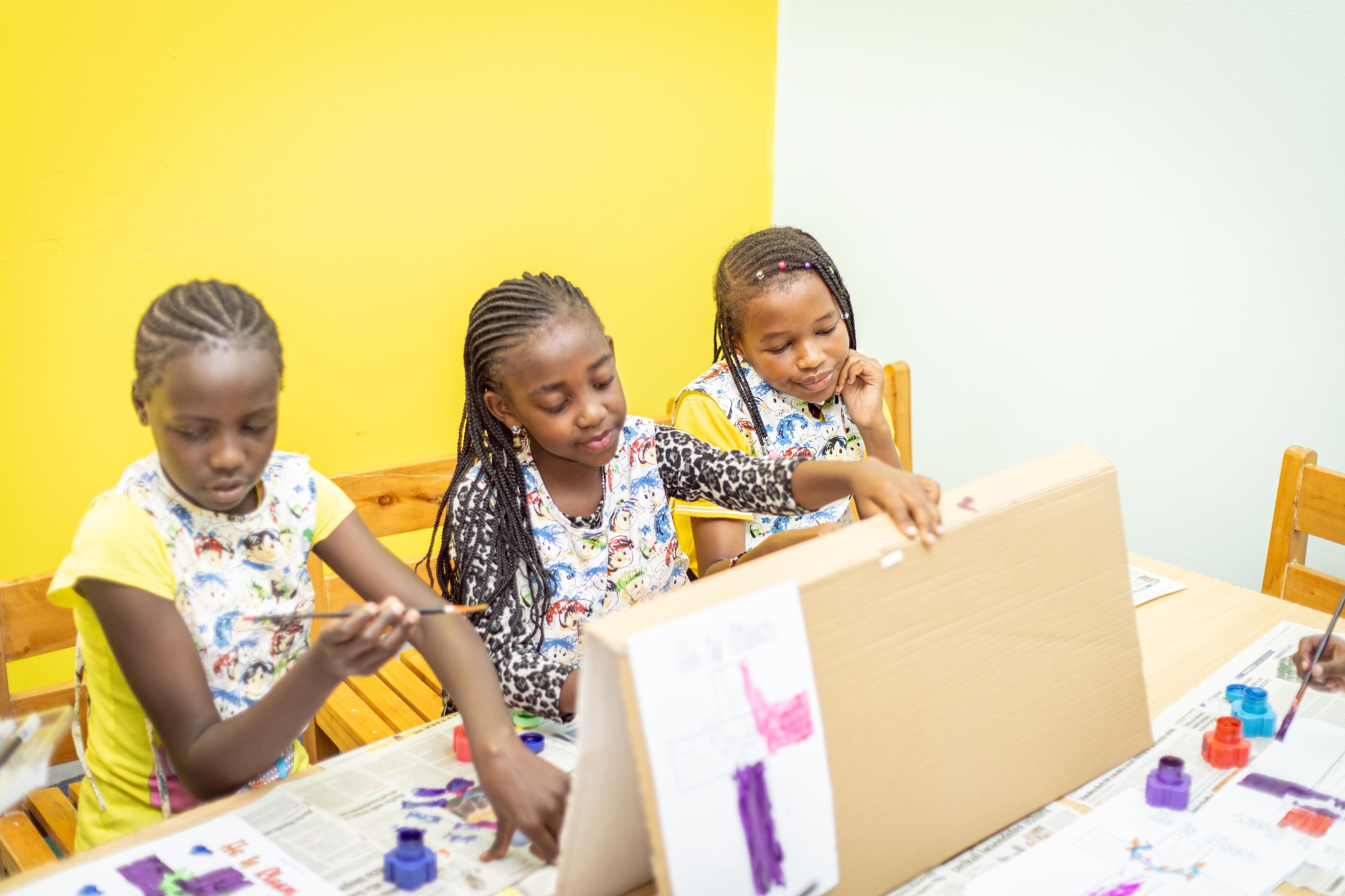 Children learning together at Glorious Dawn Montessori School