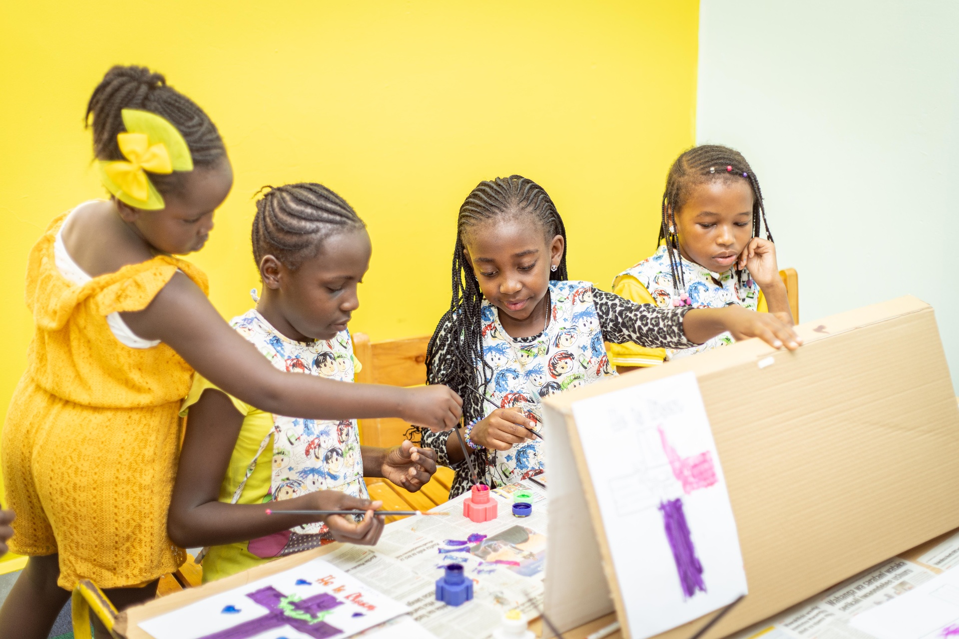 Children learning together at Glorious Dawn Montessori School